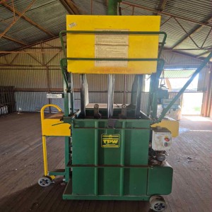 Wool bale press