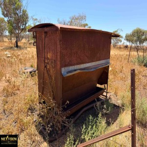 Two Older style sheep feeders